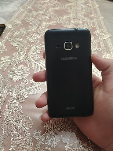 iphone xs max 512 gb: Samsung Galaxy J1 2016, 16 GB, rəng - Qara, İki sim kartlı — 1