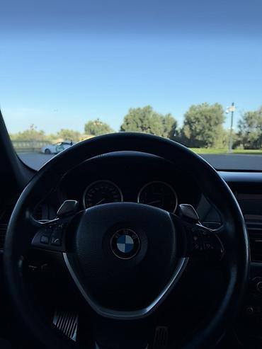 BMW: BMW X6 – ağ kuzov, qara interyer Xüsusiyyətlər: - Krossover-kupe — 1