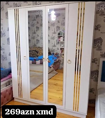 uşaq dolablari: Ağ rəngdə, 4 qapılı paltar dolabı. Orta hissədə 2 tam ölçülü güzgülü — 1