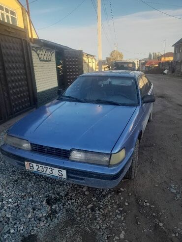 урунган машина: Mazda 626: 1989 г., 2 л, Механика, Бензин, Хетчбек