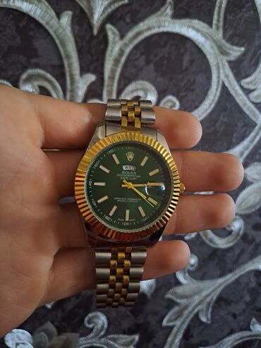 bot kişi: Yeni, Qol saatı, Rolex