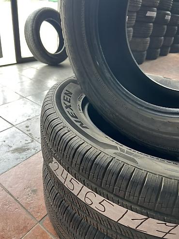 245 65 17: Комплект автомобильных шин Nexen размером 245/65 R17. На фото — 4