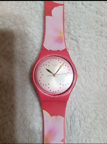 перламутр: Женские наручные часы Swatch - Кварцевый механизм - Корпус и безель — 1