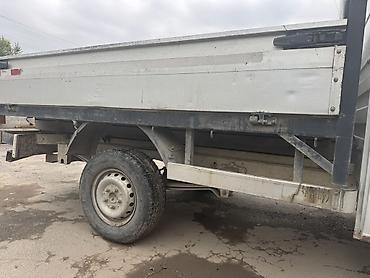 Грузовой бортовой автомобиль с двухрядной кабиной Основные