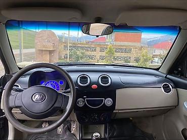 LIFAN: Lifan 320, 5 qapılı kompakt hetçbek. Xarici: - Qara rəng, xrom qapı — 12