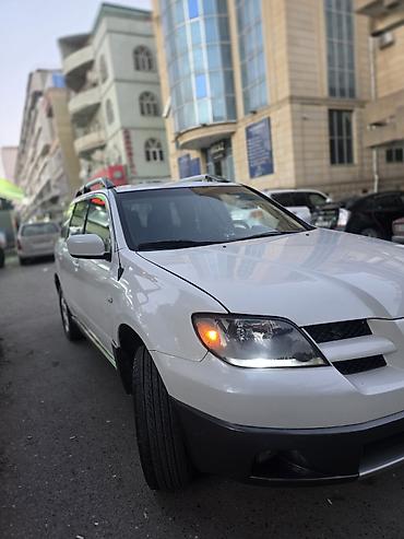 passat 2002: Mitsubishi Outlander: 2.4 l | 2002 il 285000 km Ofrouder/SUV — 2
