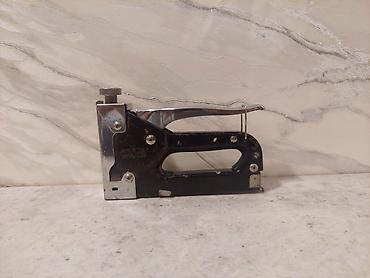 Steplerlər və bərkidici alətlər: Mexanik tikinti/çəkmə tapançası (staple gun) - Korpus: Polad — 1
