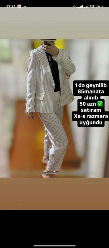 Çəkmələr: - Qara açıq-burun, açıq-daban dabanlı çəkmə-sandal qarışığı. - — 7