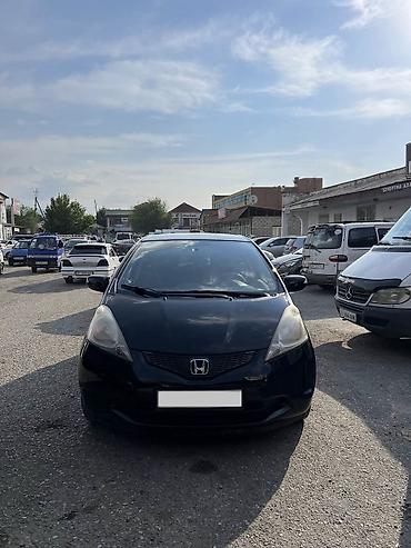 uni 260b: Honda Jazz: 2009 г., 1.3 л, Механика, Бензин, Хэтчбэк — 1