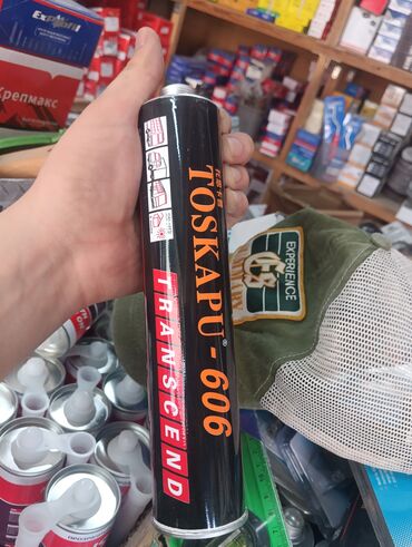 резиновые покрытия для спортивных площадок: Монтажная пена Toskapu-606 в черном баллоне. Подходит для различных