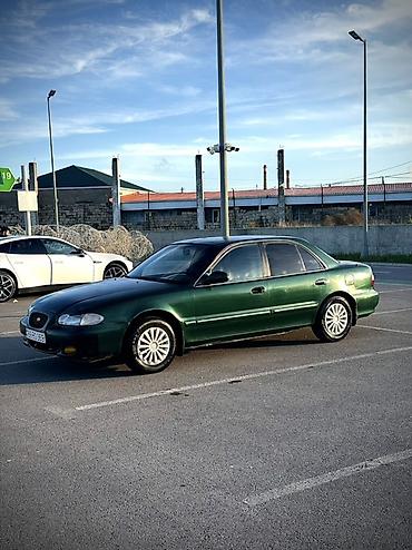 Hyundai: Hyundai Sonata: 2 l | 1997 il Sedan — 4