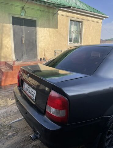 Mazda: Mazda Protege: 2001 г., 2 л, Автомат, Газ, Седан — 6