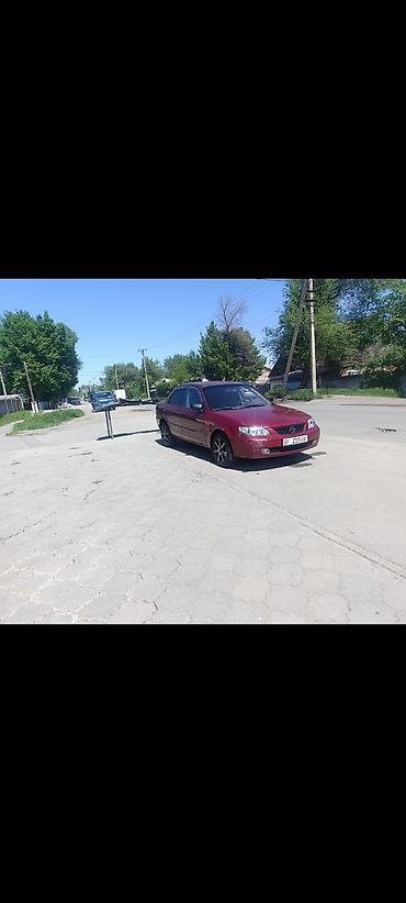 обмен на квартиры: Mazda 323: 2001 г., 1.8 л, Автомат, Бензин, Седан — 1