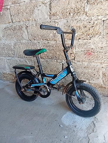 14 lük: Uşaq velosipedi – STELS markası - Təkər ölçüsü: təxminən 14" - Rəng — 2