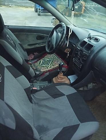 салон на гольф 2: Торпедо Mitsubishi 1996 г., Б/у, Япония — 4
