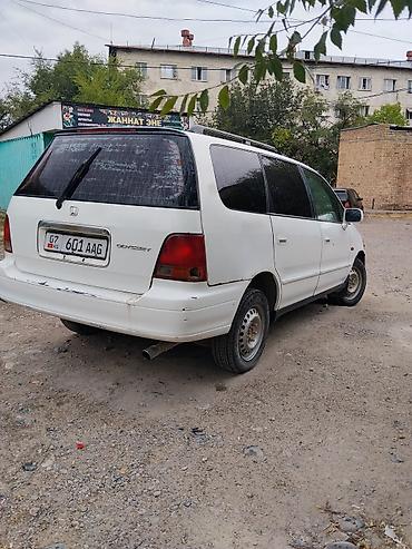одесей: Honda Odyssey: 1998 г., Минивэн — 7