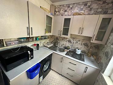 губа: **Mətbəx mebeli satılır 180₼** **ölçü dəqiq deyil** **Üzərində qaz — 1