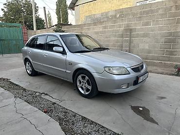 Mazda 323: 2002 г., 1.6 л, Механика, Бензин, Универсал