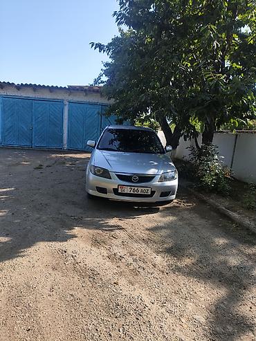 Mazda Familia: 2003 г., 1.6 л, Механика, Бензин, Универсал — 5