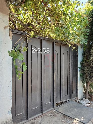 Həyət darvazaları: Darvaza yaxşı vəziyyətdə açılan tayın aşağısında yüngül çürük var amma — 2