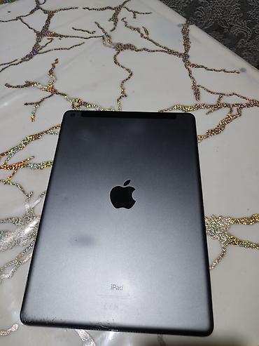 iped 9cu nesil: Apple iPad 5-ci nəsil (Model: MP2G2/MP2F2 seriyası; fotoda model — 3