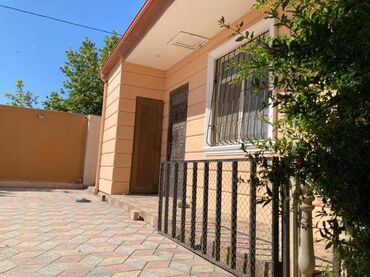 Bağ evlərinin satışı: Novxanıda əsas yoldan təxminən 200 metr məsafədə 12 sot torpaq — 18