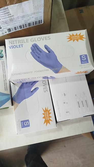 Нитриловые перчатки: Нитриловые одноразовые перчатки, голубые Особенности: - Материал — 9