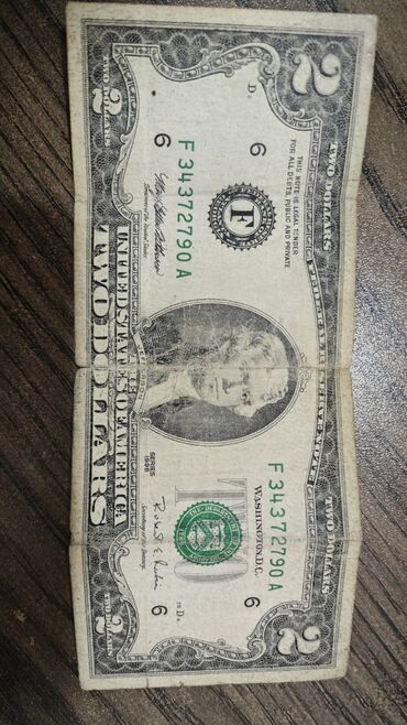 1 dollar satıram: 1995 ci il 
iki dollar 
2ədəddi