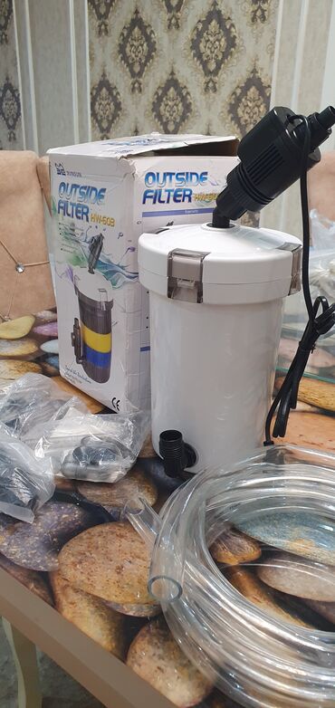 Akvarium aksessuar və ləvazimatları: Ağ rəngli silindrik korpusa malik akvarium xarici filtri. Qablaşdırma — 2