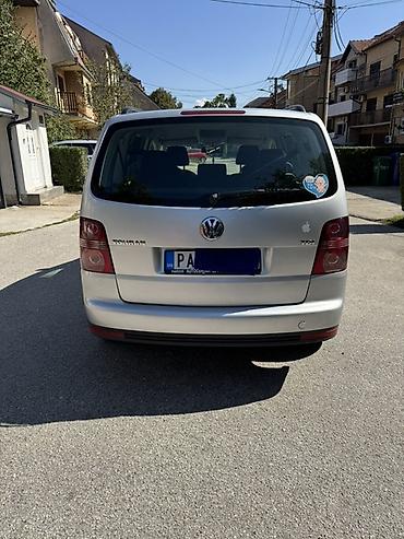 auto srbija.rs: Volkswagen Touran – porodični MPV, srebrna boja. - Motor i pogon — 8