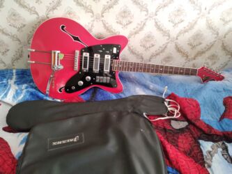 gitara gəncə: Elektrogitara Tornada. əla vəziyyətdədir. Qiyməti 1100 manat. Real