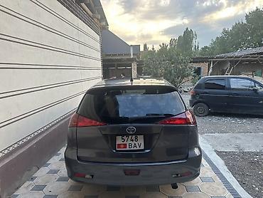 справа: Toyota Caldina: 2003 г., Универсал — 2