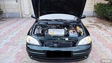 bmw e 38: Opel Astra: 1.6 l | 1999 il 400 km Sedan — 7