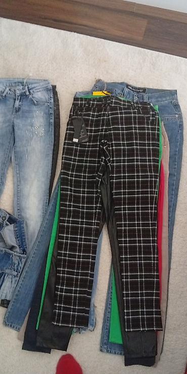 Haljine: Lot ženske odeće – pantalone/farmerke i crne koktel haljine Sadržaj — 11