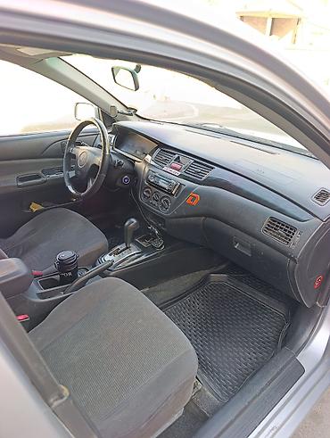mitsubishi lancer 2006: Mitsubishi Lancer: 2002 г., 1.6 л, Автомат, Газ, Седан — 7