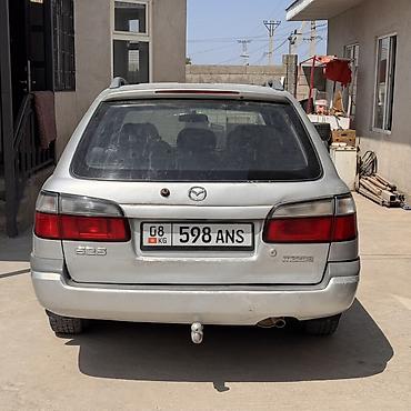 g comp: Mazda 626: 1999 г., 1.8 л, Механика, Бензин, Универсал — 4