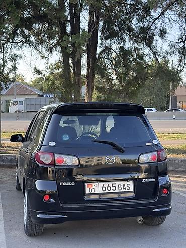 range over: Mazda Demio: 2005 г., 1.3 л, Автомат, Бензин, Хэтчбэк — 2