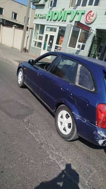 срочно продам авто в связи с переездом: Mazda 323: 2003 г., 1.6 л, Механика, Бензин, Хетчбек