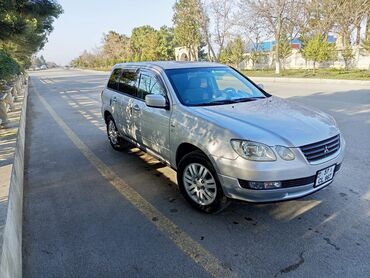 Mitsubishi: Təcili. Mitsubishi Airtrek – gümüş rəngli, şəhər və uzun yol üçün çox — 5