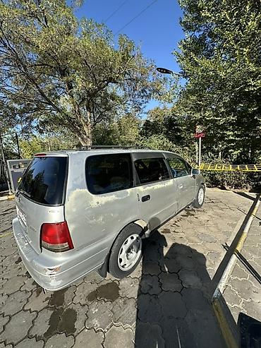 Другие детали салона: Honda — одиссей,салон минивэна. Основные особенности: - Просторный — 8