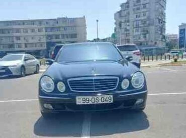 mersedes atego: Mercedes-Benz E 320: 3.2 l | 2003 il Sedan