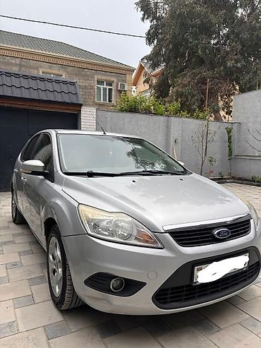 kia rio qapi: Ford Focus – gümüşü rəng, 5 qapılı hetçbek. Texniki və xarici — 1