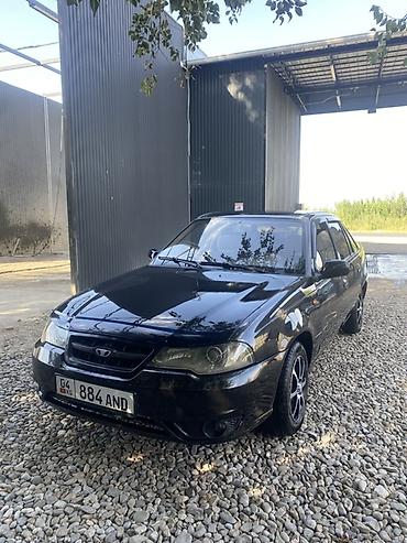салон автомобиля: Daewoo Nexia: 2011 г., 1.5 л, Седан — 1