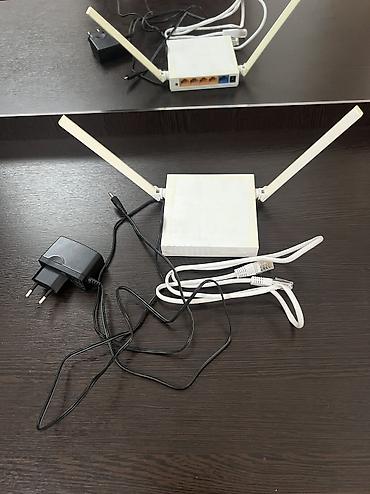 Модемы и сетевое оборудование: Wifi роутер Tp link с 4 портами на 300мб В хорошем состоянии, все — 1