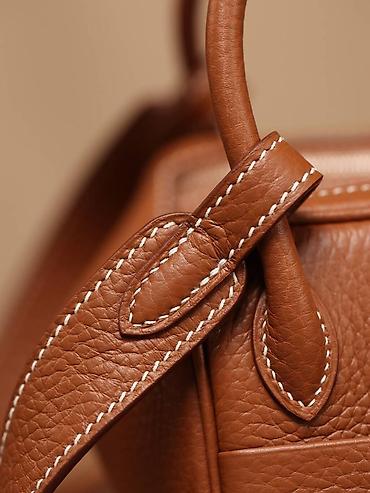 Torbe: Kožna torba u boji konjaka – kompaktan model sa ručkama - Materijal — 2