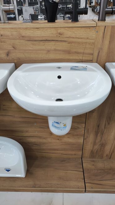 el uz yuyan qiymetleri: Oval formalı, ağ rəngli keramika lavabo. Tək kran dəliyi və daşqın