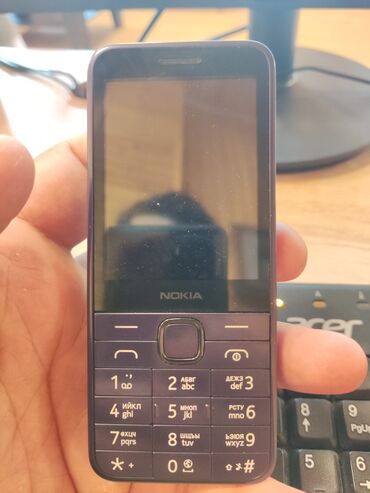 böyük kalonka: Nokia 1, rəng - Bənövşəyi, Düyməli