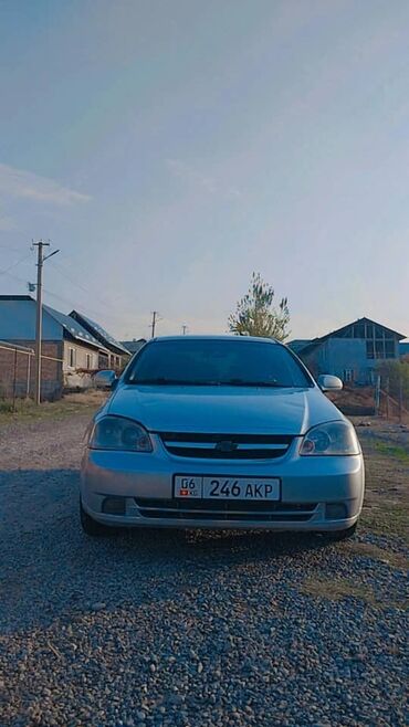 зарядник аккумулятора автомобиля: Chevrolet Lacetti: 2005 г., 1.5 л, Автомат, Газ, Седан