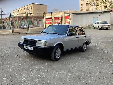 Tofas: Model: Tofaş Şahin (sedan) Kuzov: 4 qapılı, gümüşü rəng, qara plastik — 5