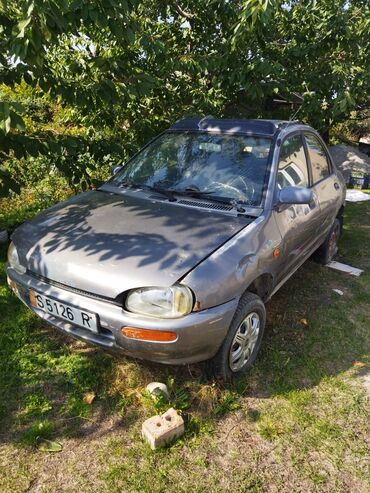 подлокотники универсальный: Mazda 121: 1991 г., 1.3 л, Механика, Бензин, Кабриолет